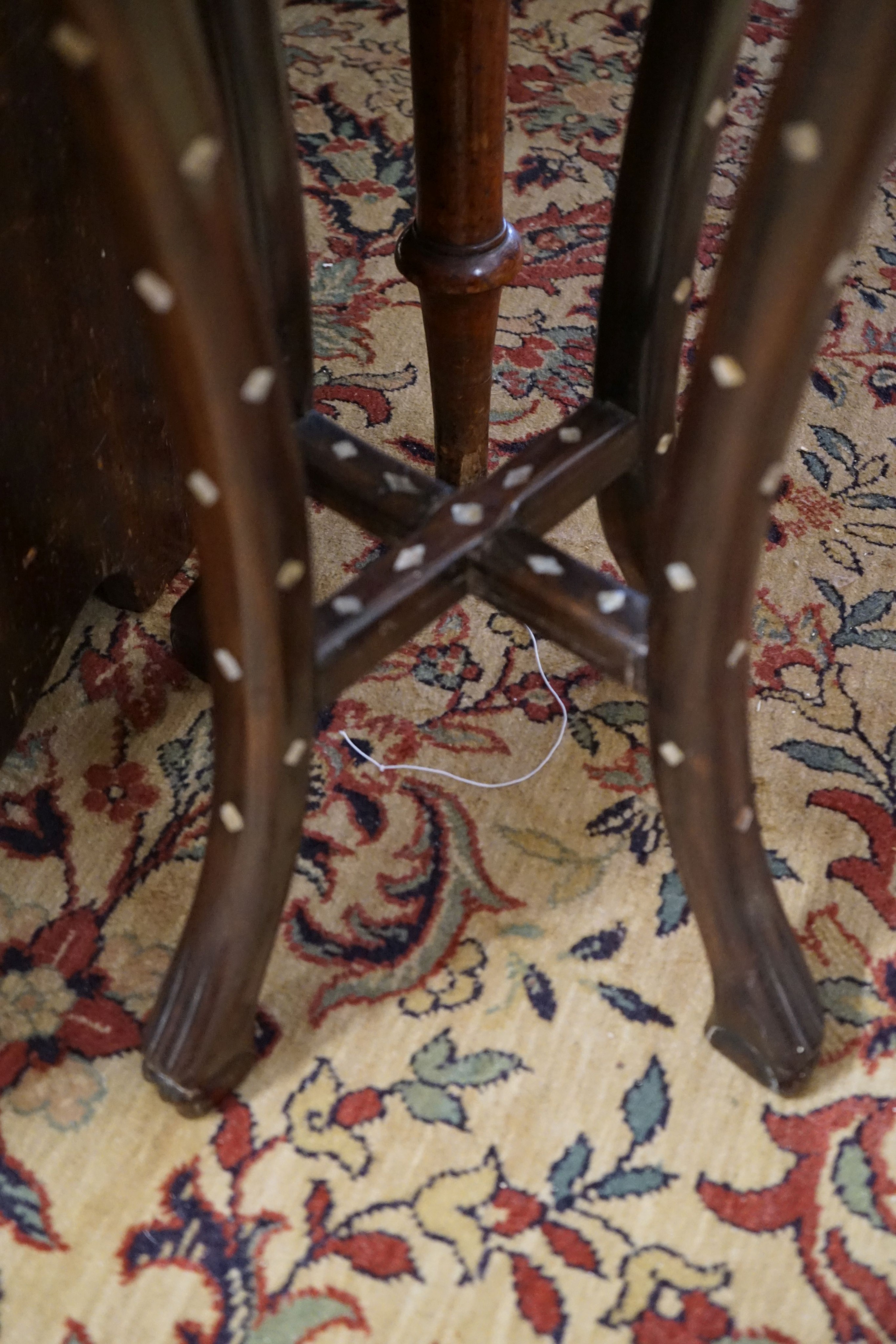 A pair of Chinese mother of pearl inset hardwood vase stands, height 92cm